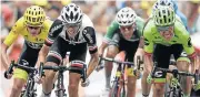  ?? /AFP ?? Flat out: Rigoberto Uran, right, sprints to win Sunday’s stage of the Tour de France ahead of Chris Froome, left, Warren Barguil, second left, and Fabio Aru.