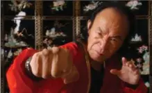  ?? RECORD FILE PHOTO ?? Grand Master Pan Qing Fu displays his calloused fist from a training program that included punching steel. He was renowned in kung fu.