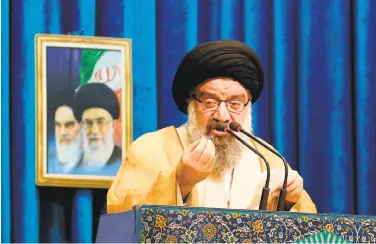  ?? Atta Kenare / AFP / Getty Images ?? Hard-line cleric Ayatollah Ahmad Khatami said “cyberspace was kindling the fire of the battle.”