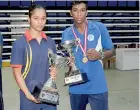  ??  ?? Best Boxers in the two women’s categories -- Kasun Maduranga and Kumari Gamage posing after receiving their awards