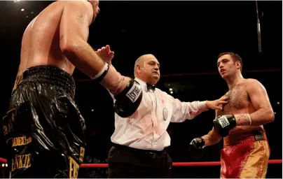  ?? Photo: ACTION IMAGES/ CARL RECINE ?? PEACEMAKER: Davies has to quell the bad blood between Smith [left] and Quigley