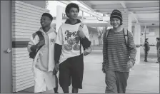  ?? ?? Amarr Wooten, Jaden Michael and Mace Coronel in “Colin in Black & White”