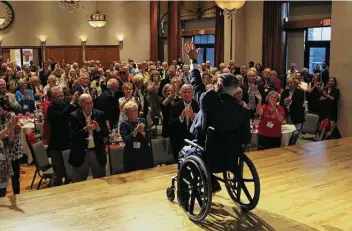  ?? Courtesy / Twitter ?? Gov. Greg Abbott waves to an unmasked crowd Monday during a Republican event in Collin County. On Tuesday, his office announced he had tested positive for COVID-19 and was receiving antibody treatment.