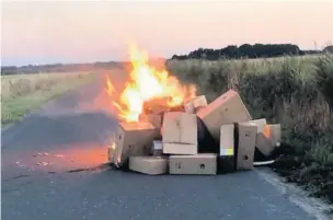  ?? Adam Stanton burned dumped cardboard boxes near a stubble field during last year’s heatwave ??