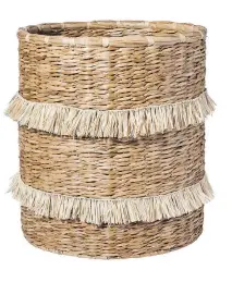  ?? TARGET ?? You’ll see many variations on fringe this year, including a basket by designer Nate Berkus for Target.