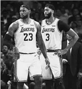  ?? HARRY HOW/GETTY ?? LeBron James (23) and Anthony Davis will play on Christmas Day as teammates for the first time.