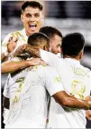  ?? JACOB GONZALEZ/ATLANTA UNITED ?? Atlanta United forward Josef Martinez (7) celebrates with teammates after scoring the first goal of the match against D.C. United on Saturday.