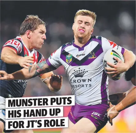  ??  ?? RED HOT: Cameron Munster of the Storm tries to evade a tackle during Melbourne’s win over the Broncos in Brisbane last night.