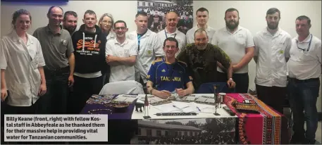  ??  ?? Billy Keane (front, right) with fellow Kostal staff in Abbeyfeale as he thanked them for their massive help in providing vital water for Tanzanian communitie­s.