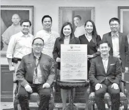  ??  ?? GINA founder Tom Navasero with Philab team and UST College of Science faculty pose with the deed of donation in a recent turnover ceremony of two genetic sequencing equipment to the university. The equipment is poised to bolster the department’s research and hands-on training on genomics.