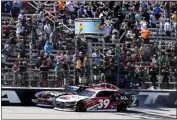  ?? LARRY PAPKE — THE ASSOCIATED PRESS ?? Sam Mayer, rear, edges out Ryan Sieg at the finish line to win the NASCAR Xfinity Series race in Fort Worth, Texas.