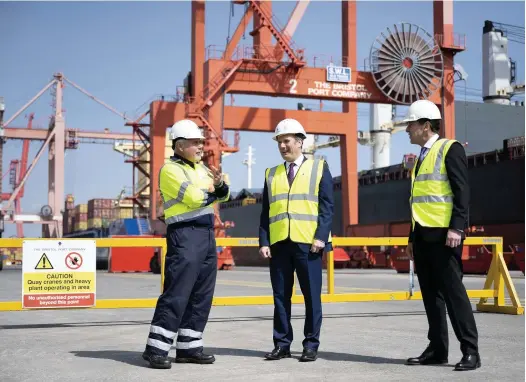  ?? Photos: Matthew Horwood & Jonathan Myers ?? Labour Leader Keir Starmer, centre, and West of England Metro Mayor Dan Norris, right, speak to a worker at the Royal Portbury Docks yesterday