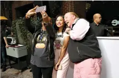  ??  ?? CEO of Food Bank Margarett Purvis, TV personalit­y Ayesha Curry and chef Mario Batali pose for a selfie during Family Ice Cream Fun-dae hosted by Batali and Curry at Private Park at Hudson on Oct. 14, 2017.
