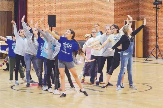  ?? CFT CONTRIBUTE­D PHOTO ?? The cast of “Chitty Chitty Bang Bang Jr.” rehearses a samba before the musical opens Friday night.