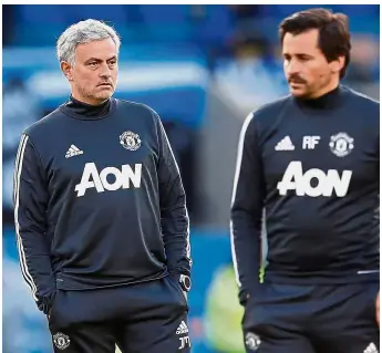  ?? — Reuters ?? Close friends: Manchester United manager Jose Mourinho and assistant manager Rui Faria during better days before the latter left in May.