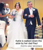  ?? PHOTO: GRAY WEDDINGS ?? Katie is walked down the aisle by her dad Paul