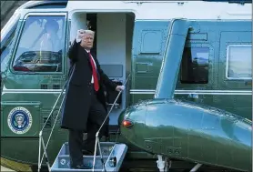  ?? ALEX BRANDON — THE ASSOCIATED PRESS ?? President Donald Trump gestures as he boards Marine One on the South Lawn of the White House, Wednesday, Jan. 20, in Washington.