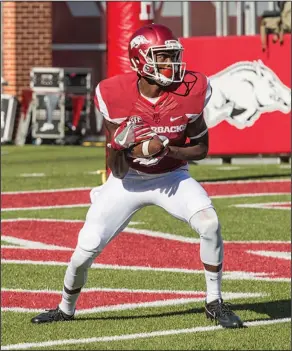  ?? Alan Jamison/Special to the News-Times ?? Kickoff return: Arkansas' Dominique Reed returns a kickoff during the Razorbacks' victory over Louisiana Tech earlier this season. Last week, Reed caught a 51-yard touchdown pass from Austin Allen in Arkansas' win over Mississipp­i, and the Razorbacks...