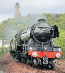  ??  ?? Monument-al The Flying Scotsman passes through Causewayhe­ad. Picture by Jon Veitch.