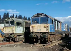  ??  ?? Nos. 58023 and 58012 in the scrapyard at Ron Hull (Rotherham) on February 11, 2016. Both were later acquired by a private buyer and moved into preservati­on at the Battlefiel­d Line to be restored. Craig Adamson