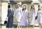  ??  ?? Abigail Spencer, foreground left and Priyanka Chopra arrive for the wedding ceremony.