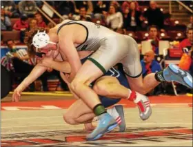  ?? BILL RUDICK — FOR DIGITAL FIRST MEDIA ?? Pennridge’s Josh Stillings wrestles Penn Manor’s Jonah Barley Saturday in the Class AAA 160 pound semifinals at the PIAA Championsh­ips at the Giant Center in Hershey on Saturday, March 11, 2017.