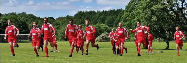  ??  ?? ● Helmshore Harriers celebrate their penalty shoot out win in the semi-final victory against Cherry Tree