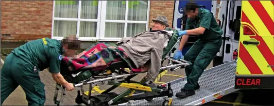  ??  ?? ‘Heart-breaking’: James Bryant being removed from the care home. The paramedics’ faces have been obscured to protect their identities