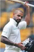  ??  ?? Shikhar Dhawan smashed a century before lunch yesterday