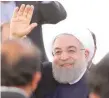  ?? — Reuters ?? Rouhani waves towards the media as he exits Makkah Masjid.