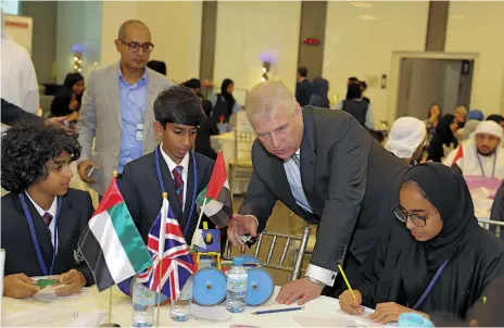  ?? Pawan Singh / The National ?? Prince Andrew, Duke of York, talking to the students of Brighton College Abu Dhabi yesterday. He is mentoring current and future entreprene­urs at several events during his visit to the UAE