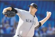  ?? Fred Thornhill / Associated Press ?? Yankees starting pitcher James Paxton delivers against the Blue Jays on Saturday.