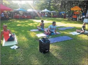  ?? PHOTOS COURTESY MADISON COUNTY HISTORICAL SOCIETY ?? YMCA of Oneida will offer free yoga at the Cottage Lawn Farmers Market at the Madison County Historical Society on Tuesdays from 3-7p.m.