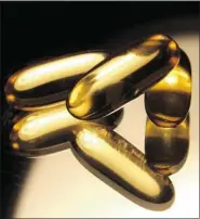  ?? Handout ?? Fish oil pills may not help ward off heart attacks and strokes for those with heart disease, new research finds.