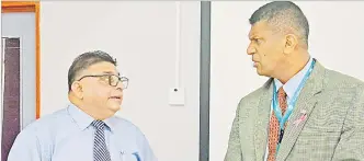 ?? Picture: ABISHEK CHAND ?? Copra Millers Fiji chairman Raj Sharma, left, with member of Parliament Aseri Radrodro.
