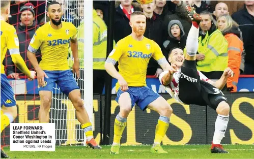  ?? PICTURE: PA Images ?? LEAP FORWARD: Sheffield United’s Conor Washington in action against Leeds