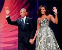  ?? AP file ?? Barack Obama’s book will be a memoir about his presidency, while Michelle Obama plans to write an inspiratio­nal work for young people. —