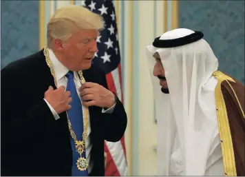  ?? PICTURE: ASSOCIATED PRESS PICTURE: REUTERS ?? Saudi Arabia’s King Salman bin Abdulaziz Al Saud, right, presents US President Donald Trump with the Collar of Abdulaziz Al Saud Medal at the Royal Court in Riyadh, Saudi Arabia, on Saturday.