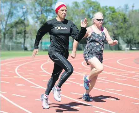  ?? TROY FLEECE / REGINA LEADER-POST ?? Masters track athlete Carol LaFayette-Boyd (left) trains with longtime fellow athlete Selina Coward at the Canada Games Athletics Complex.