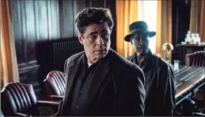  ?? Claudette Barius / Associated Press ?? This image released by Warner Bros. Pictures shows Benicio del Toro, left, and Don Cheadle in a scene from “No Sudden Move.”