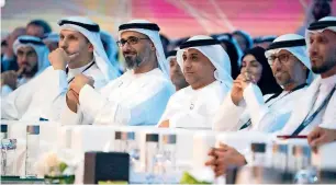  ??  ?? Suhail bin Mohammed Faraj Faris Al Mazrouei, UAE Minister of Energy and industry, and other officials at the announceme­nt of the hub71 initiative in Abu Dhabi on Sunday. —