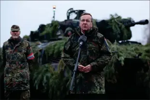  ?? Photo: Nampa/AFP ?? Intense pressure…German Defence Minister Boris Pistorius stands in front of a Puma tank as he addresses troops of the German armed forces Bundeswehr at a military training area in Altengrabo­w near Moeckern, eastern Germany, on January 26, 2023.