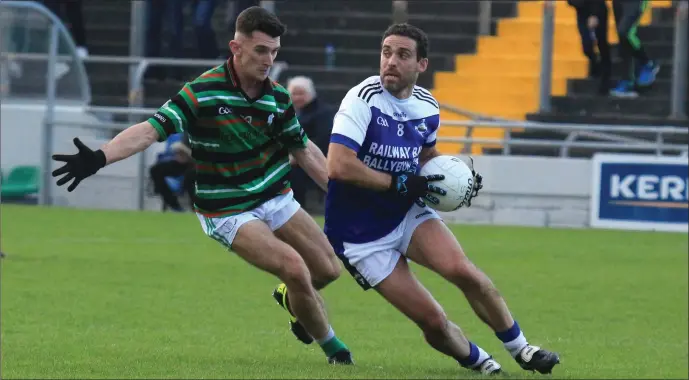  ?? Photo by Domnick Walsh ?? Jeremy King of Shannon Rangers is marked by St Brendans’ James Duggan in their County Senior Football Championsh­ip match in Tralee