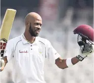  ?? AP ?? West Indies batsman Roston Chase celebrates scoring a century during the second day of the second Test match against India in Hyderabad, India, yesterday.