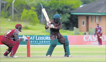  ?? Picture: SINO MAJANGAZA ?? ON ATTACK: Border’s Mncedisi Malika opens his shoulders for a big hit during the exciting match against North West yesterday