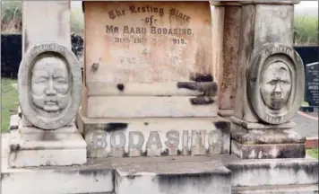  ??  ?? Babu Bodasing’s grave at the Bodasing family cemetery. According to Pat Bodasing, when his grandfathe­r died, he was cremated as per traditiona­l Hindu culture. However, some of his ashes were kept and buried at the cemetery.