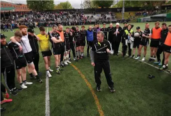  ??  ?? Sligo manager Niall Carew speaks with his team after their win in Gaelic Park, New York.