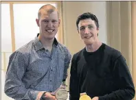  ?? SUBMITTED PHOTO ?? Paralympic gold medalist Mark Arendz displays his recent medals to Curtis Weber, the keynote speaker for this year’s Workplace Health and Safety Conference.