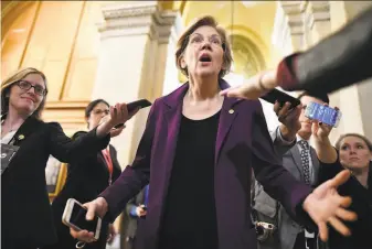  ?? Mandel Ngan / AFP via Getty Images ?? Sen. Elizabeth Warren’s proposal comes as the coronaviru­s has killed more than 100 people in China. The U.S. has confirmed cases in Washington state, Illinois, California and Arizona.