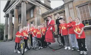  ??  ?? PENNY FOR THEM: Pupils from Ryhope Junior School at Monkwearmo­uth
Station Museum.